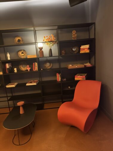 Illuminated display shelves in the Moxy hotel interior