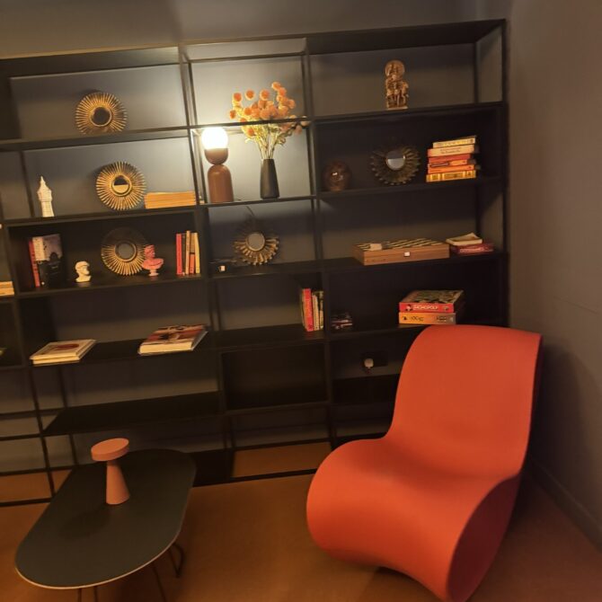 Illuminated display shelves in the Moxy hotel interior