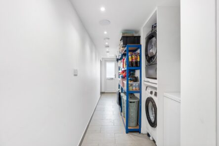 Hallway with recessed ceiling lights at 6 Peters Avenue