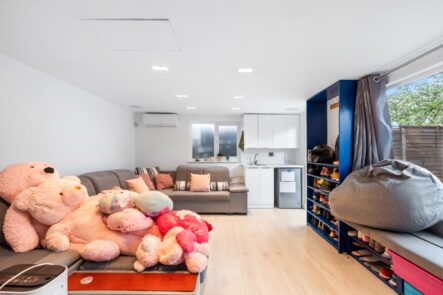 Kitchen and dining space with recessed ceiling lights at 6 Peters Avenue