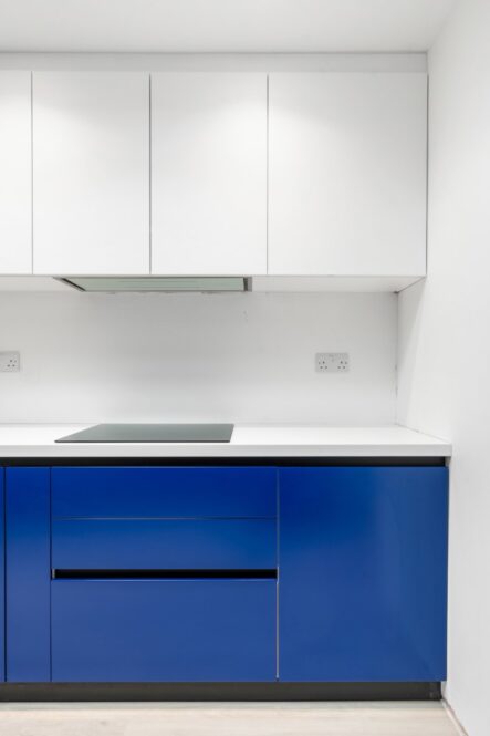 White kitchen wall cabinets and splashback at 6 Peters Avenue