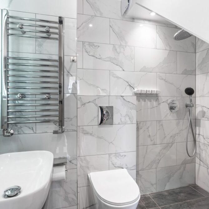 Tiled bathroom with heated towel rail at 6 Peters Avenue