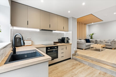 Fitted kitchen and island lighting at 57 St Marys Drive