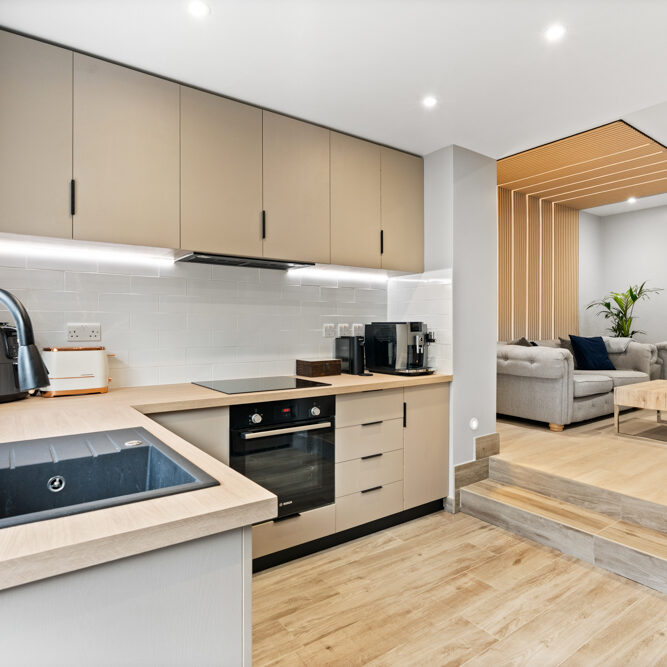 Fitted kitchen and island lighting at 57 St Marys Drive