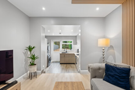 Open-plan living space with ceiling downlights at 57 St Marys Drive