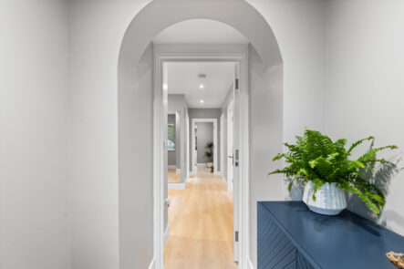 Arched hallway opening with ceiling downlights at 57 St Marys Drive