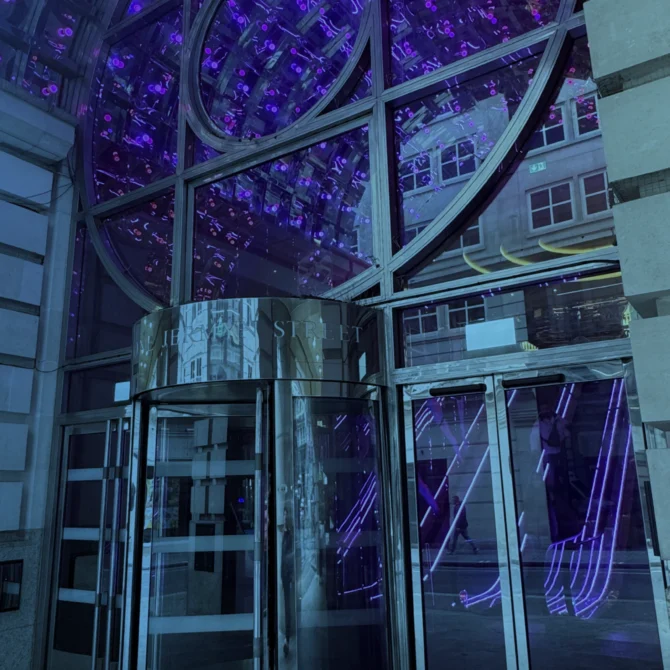 Moxy hotel entrance with purple decorative lighting